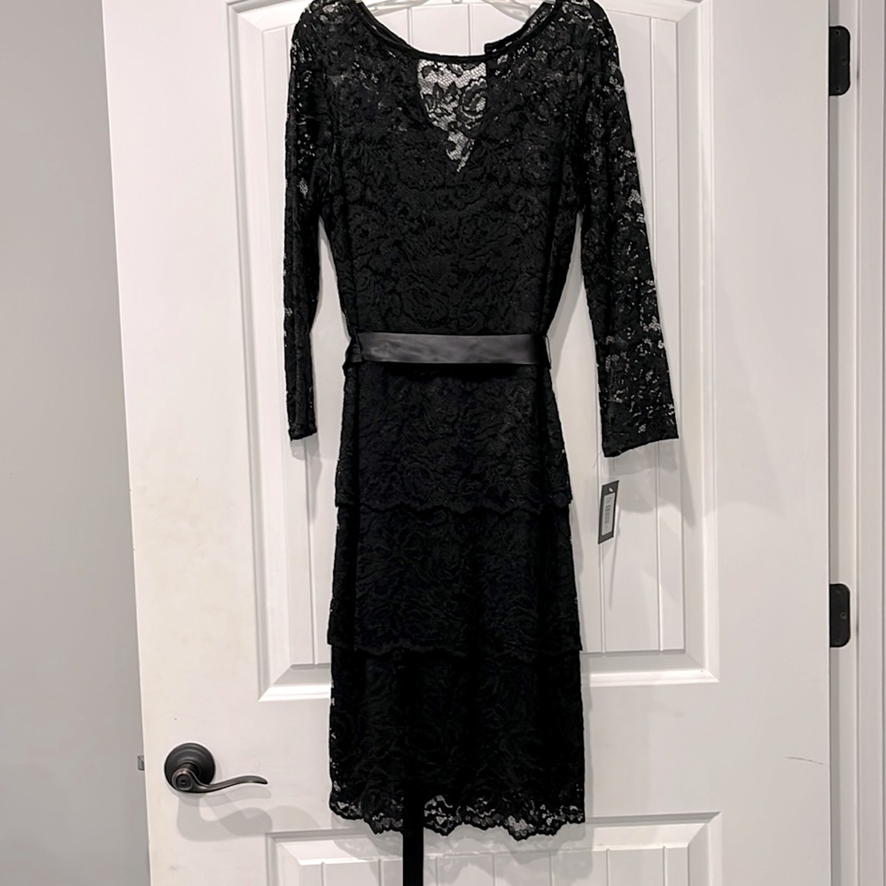 Marina black lace dress. NWT, there’s lace bottom. Ribbon tie waist. Size 8